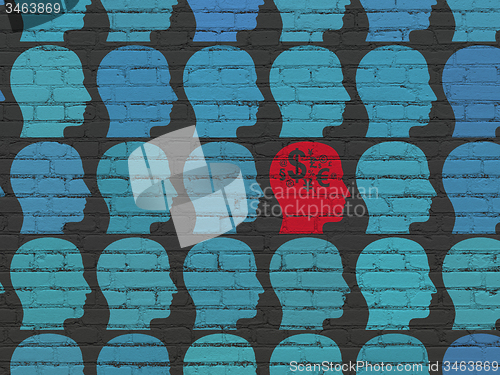 Image of Business concept: head with finance symbol icon on wall background