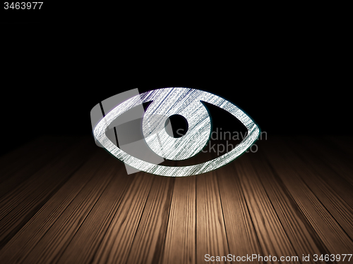 Image of Protection concept: Eye in grunge dark room