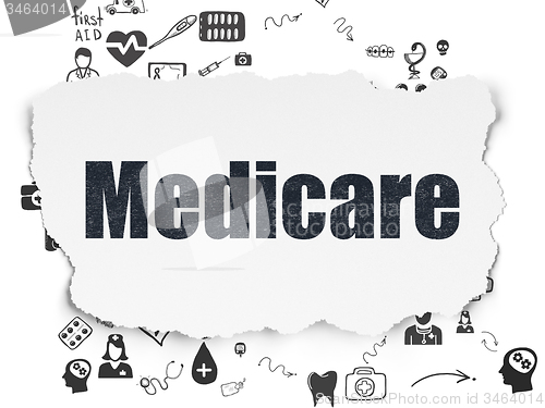 Image of Health concept: Medicare on Torn Paper background