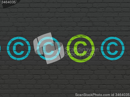 Image of Law concept: copyright icon on wall background