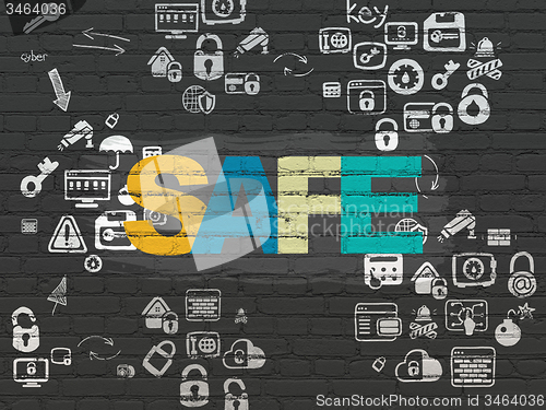 Image of Protection concept: Safe on wall background