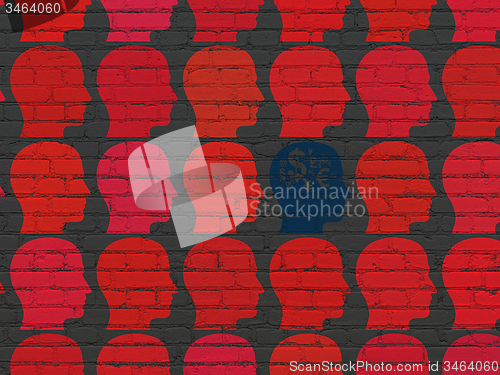 Image of Finance concept: head with finance symbol icon on wall background