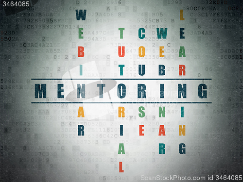 Image of Studying concept: word Mentoring in solving Crossword Puzzle