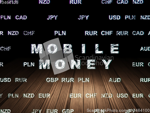 Image of Money concept: Mobile Money in grunge dark room