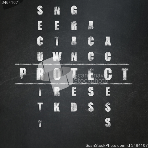 Image of Safety concept: word Protect in solving Crossword Puzzle