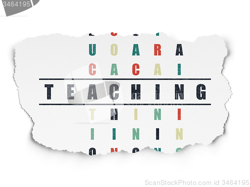 Image of Learning concept: word Teaching in solving Crossword Puzzle