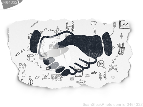 Image of Finance concept: Handshake on Torn Paper background