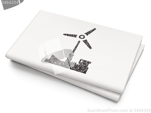 Image of Manufacuring concept: Windmill on Blank Newspaper background