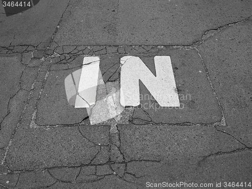 Image of Black and white In sign