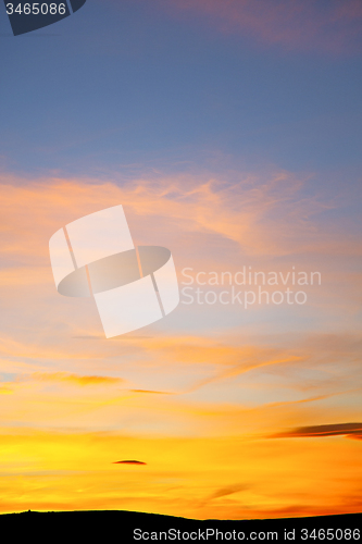 Image of   in   colored sky  clouds and abstract  