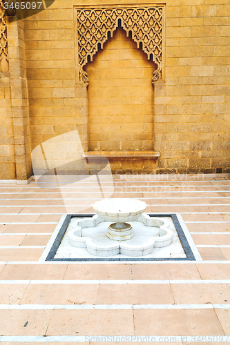 Image of fountain in morocco  antique construction   palace