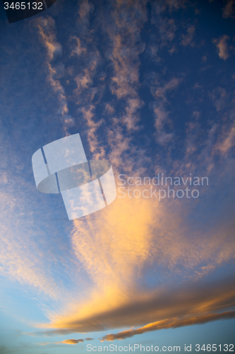 Image of sunrise in the colored sky white soft clouds  