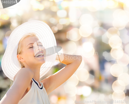 Image of beautiful woman enjoying summer outdoors