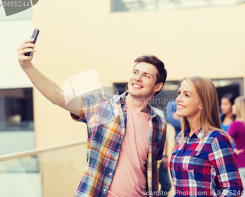 Image of group of smiling students outdoors