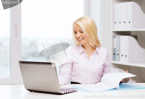 Image of smiling businesswoman or student with laptop