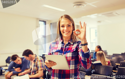 Image of group of smiling students with tablet pc