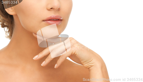 Image of face and hands of beautiful woman