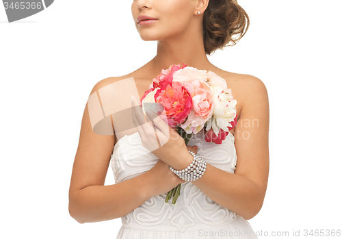 Image of woman with bouquet of flowers