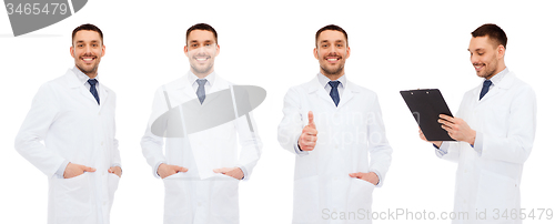 Image of happy doctors with clipboard showing thumbs up