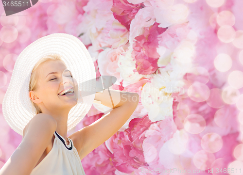 Image of beautiful woman enjoying summer outdoors