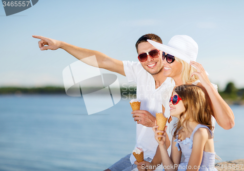 Image of happy family eating ice cream