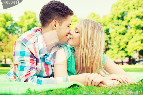 Image of smiling couple in park