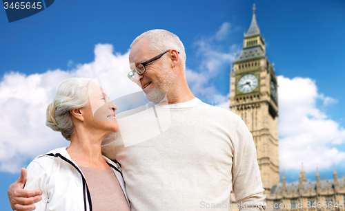 Image of happy senior couple over big ben tower in london