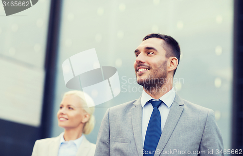 Image of close up of smiling businessmen