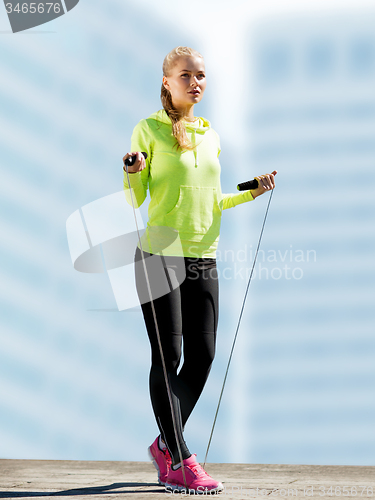 Image of woman doing sports outdoors