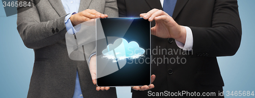 Image of businessman and businesswoman with tablet pc