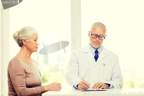 Image of senior woman and doctor meeting