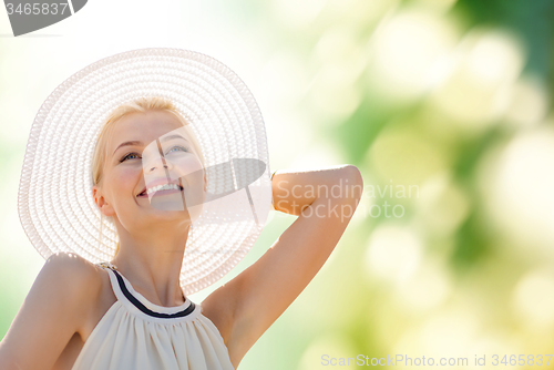 Image of beautiful woman enjoying summer outdoors