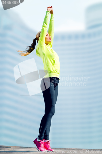 Image of woman doing yoga outdoors