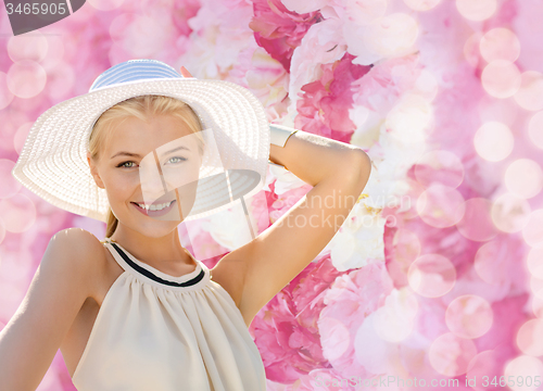 Image of beautiful woman enjoying summer outdoors