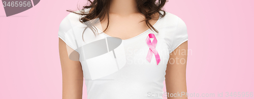 Image of woman with pink cancer awareness ribbon