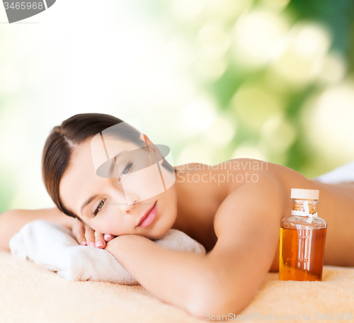 Image of happy woman in spa salon