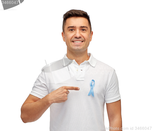 Image of smiling man with prostate cancer awareness ribbon