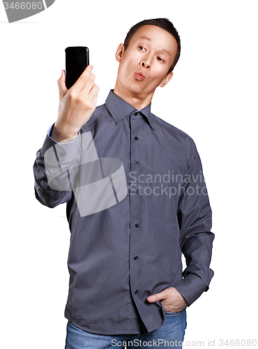 Image of Asian Man Making A Selfie