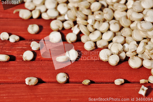 Image of Quinoa and a wooden background.