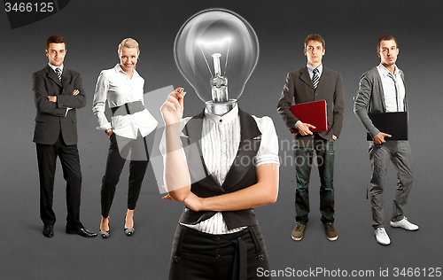 Image of Business Team With Lamp Head