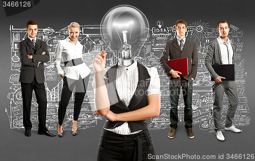 Image of Business Team With Lamp Head