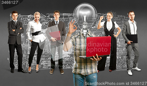 Image of Business Team With Lamp Head