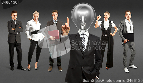 Image of Business Team With Lamp Head