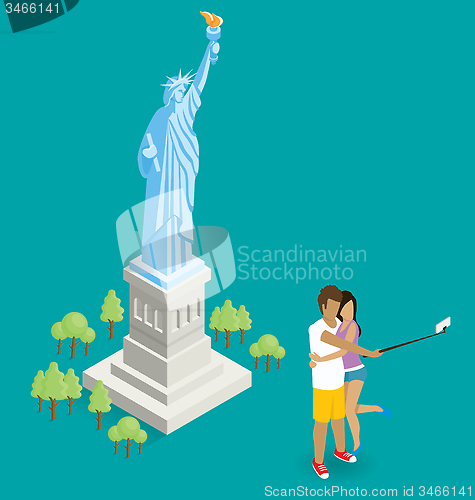 Image of Couple Making Selfie Near The Statue of Liberty in USA