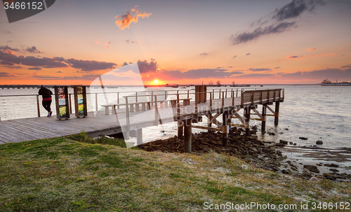 Image of Golden sun setting over Botany Bay