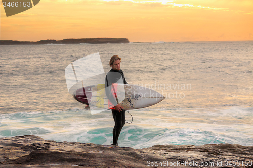 Image of Surfer at sunrise