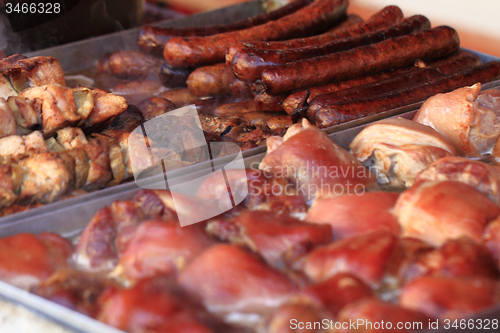 Image of grilled meat and sausages