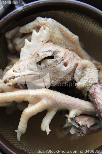 Image of chicken head food leg