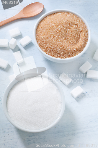 Image of Different types of sugar: brown, white and refined sugar