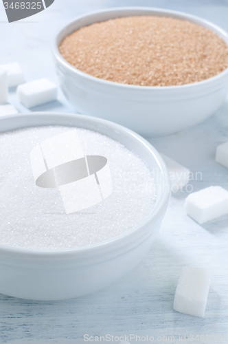 Image of Different types of sugar: brown, white and refined sugar